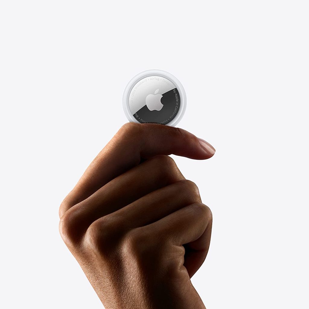 Apple Airtag in a persons hand